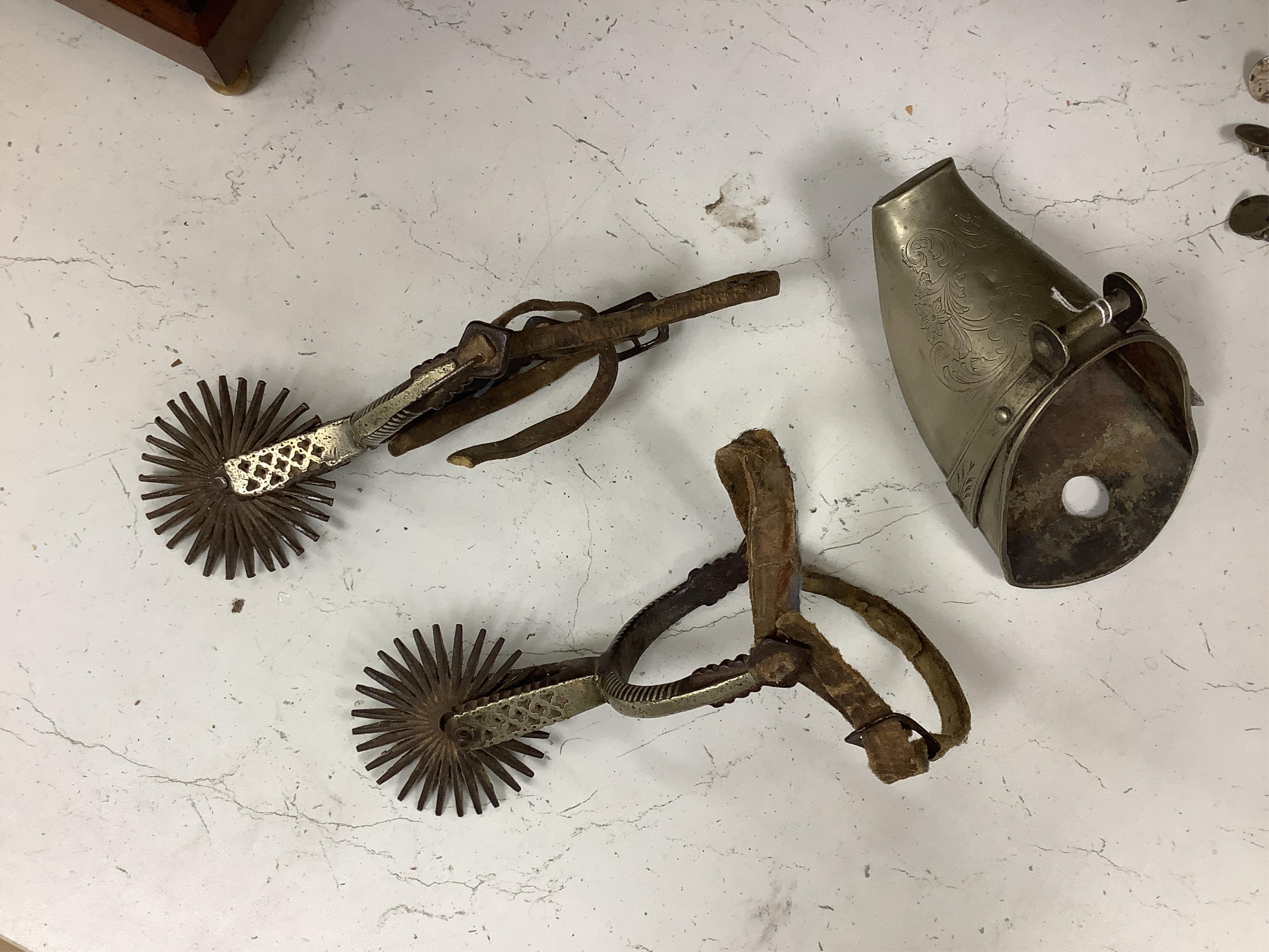 A group of Argentinian Gaucho spurs, bolas, bull whip, daggers and hanger, Longest 100cm